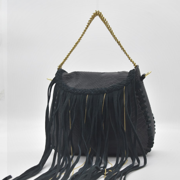 Model wearing MEA fringe bag crossbody, gold chainmail trim