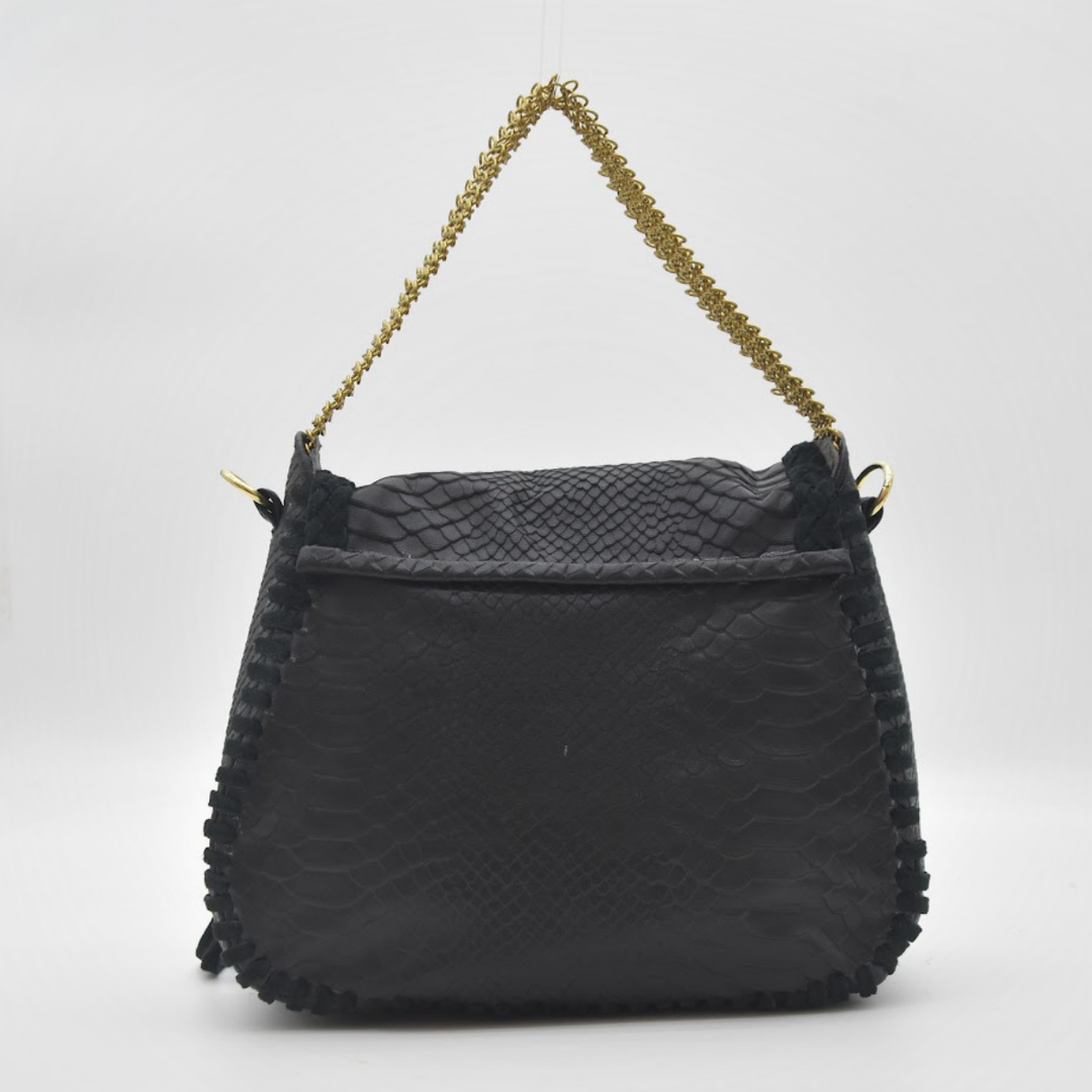 MEA shoulder bag worn on body, close front detail