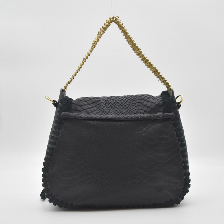 MEA shoulder bag worn on body, close front detail