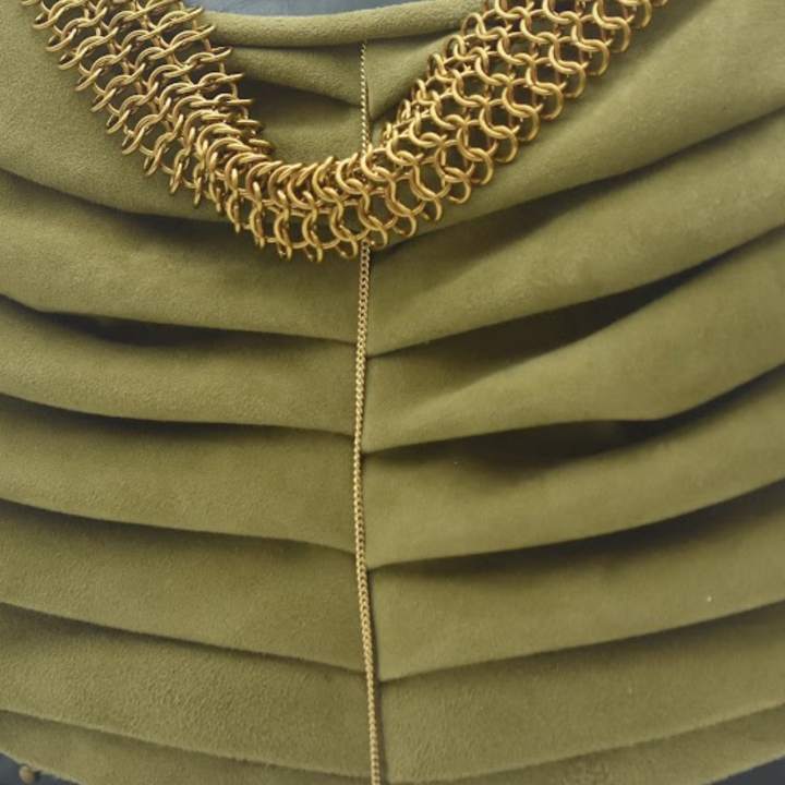 IVY handmade green suede shoulder bag, brass chainmail detail close-up
