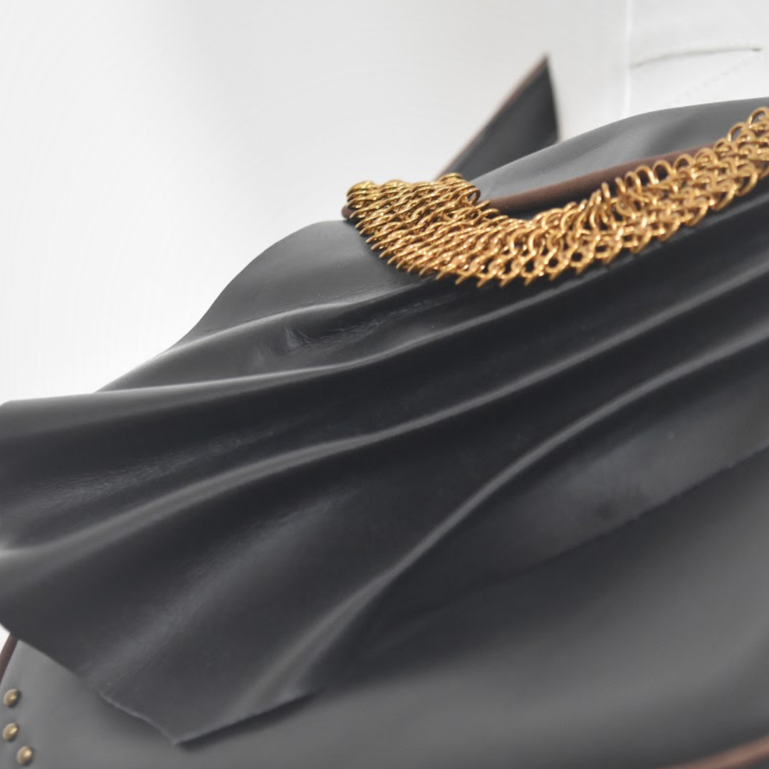 ISIS limited edition black saddle bag, crossbody by day, handbag by night