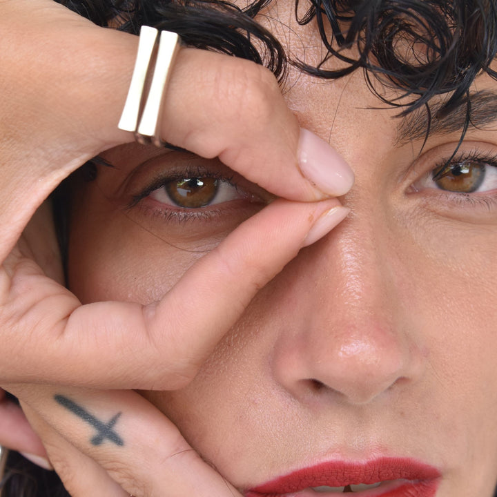 NOA sterling silver omega ring on hand, delicate handmade jewellery