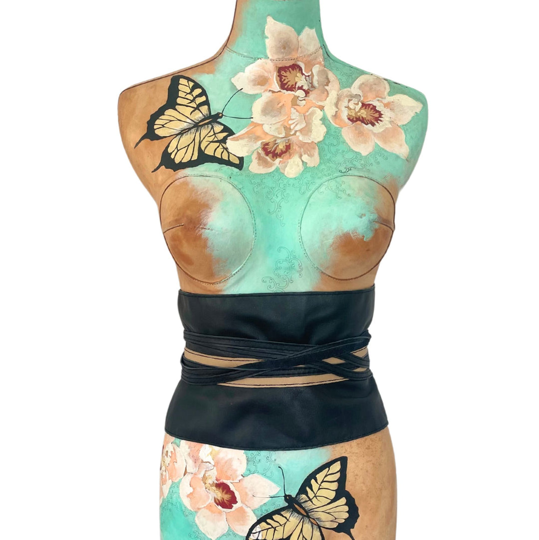 Japanese-inspired black leather wrap belt with tan suede center and long double ties designed to wrap three times around the waist.