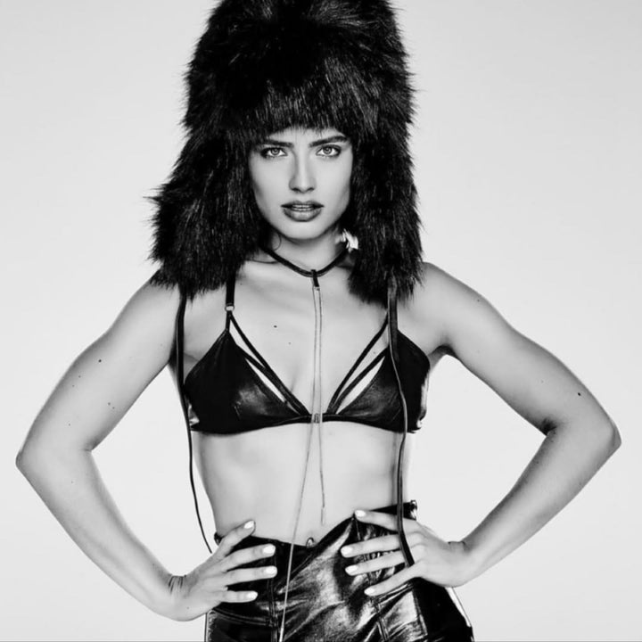 Bold editorial look — EVA Choker worn by a fierce model, leather and sterling silver drop necklace styled with high-fashion rock & roll attitude.