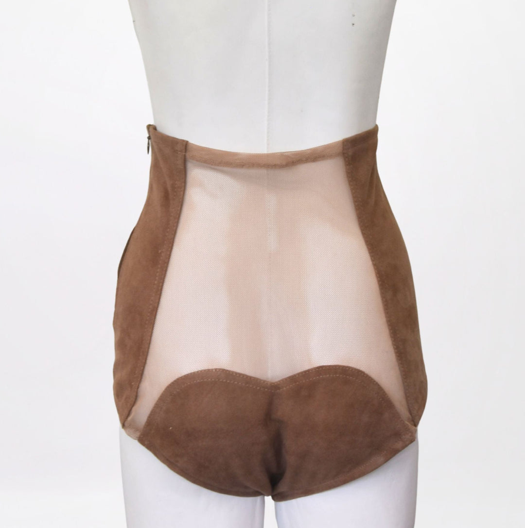 Brown bodysuit with sheer panels on a mannequin against a white background