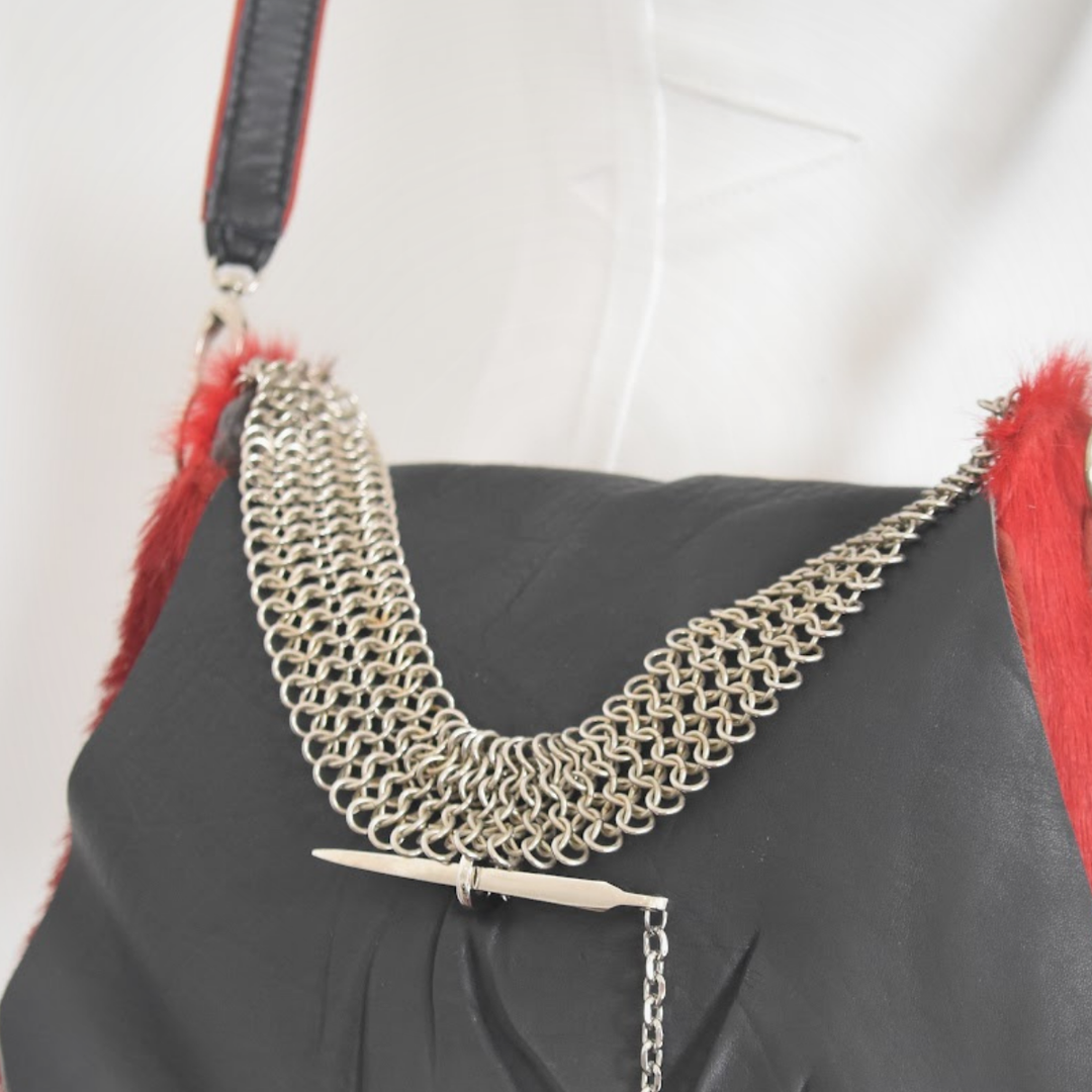 RED RUBY red springbok shoulder bag with black leather flap